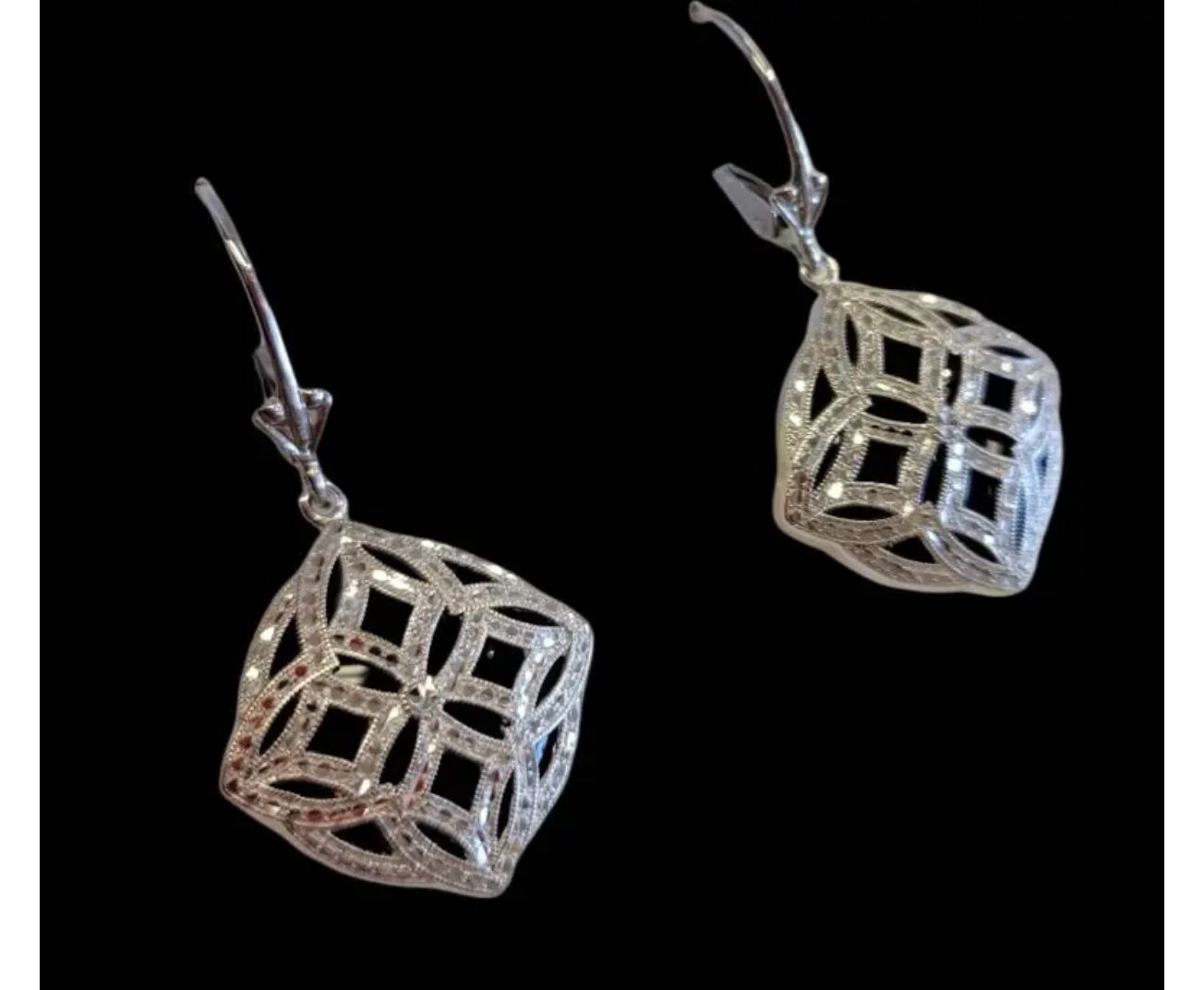 A pair of silver earrings